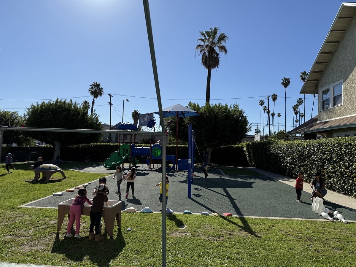 Preschool activity photo showing children learning and playing, image 2 of 6