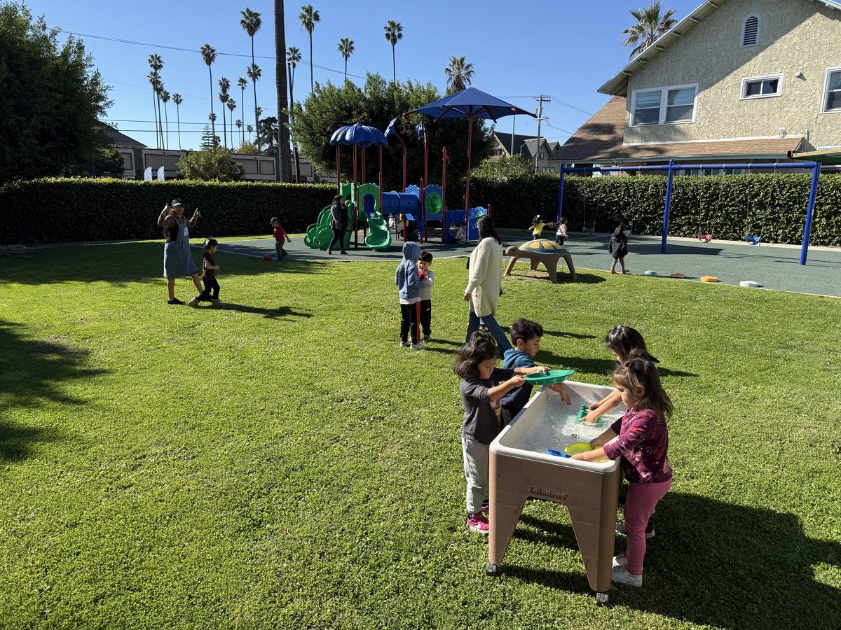 Preschool activity photo showing children learning and playing, image 3 of 6
