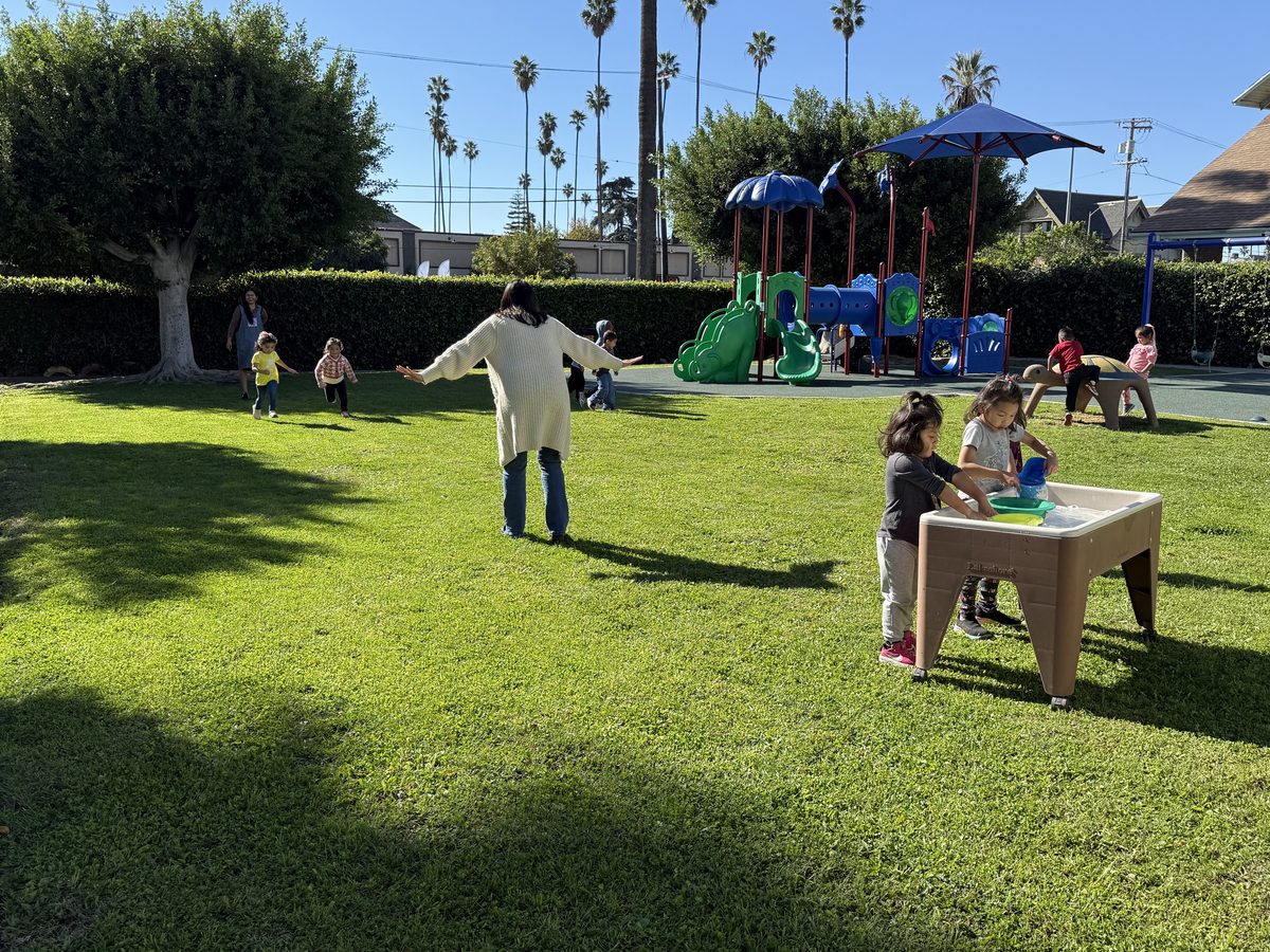 Preschool activity photo showing children learning and playing, image 5 of 6