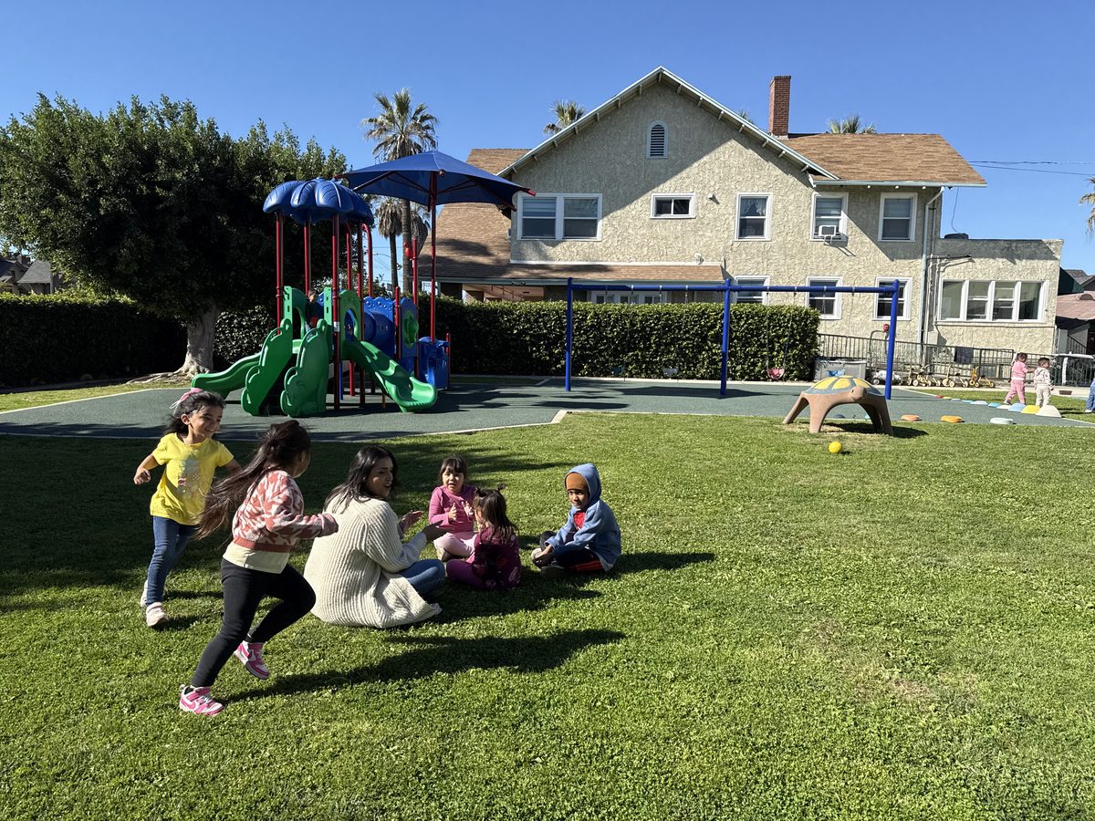 Preschool activity photo showing children learning and playing, image 6 of 6
